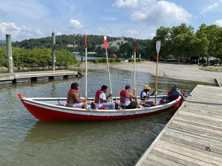 Youth are lifted by this Rising Tide boat building program