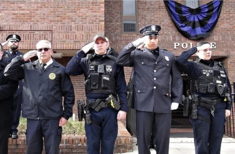 Peekskill Police Chaplain Robert Lindenberg, left, with officers on the day of Jones funeral.   Photo from Peekskill Police Department Instagram Page. (peekskillpolice1)
