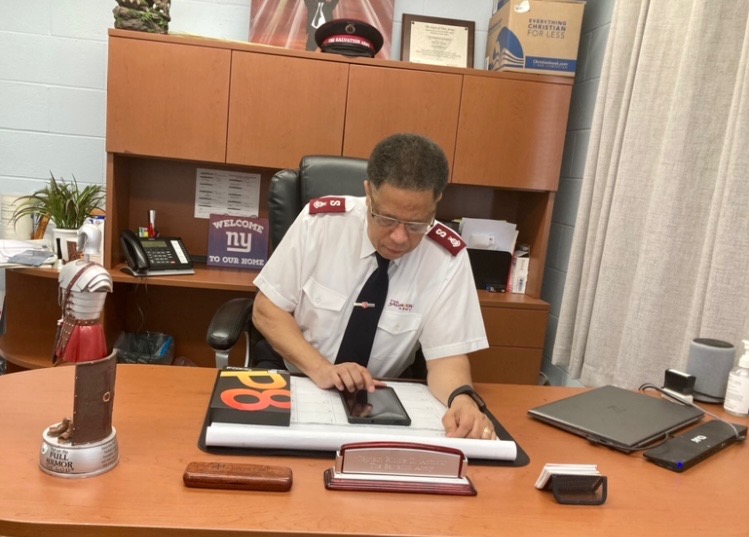 Major Rickie Armour of the Salvation Army with one the free tablets being supplied this week. 