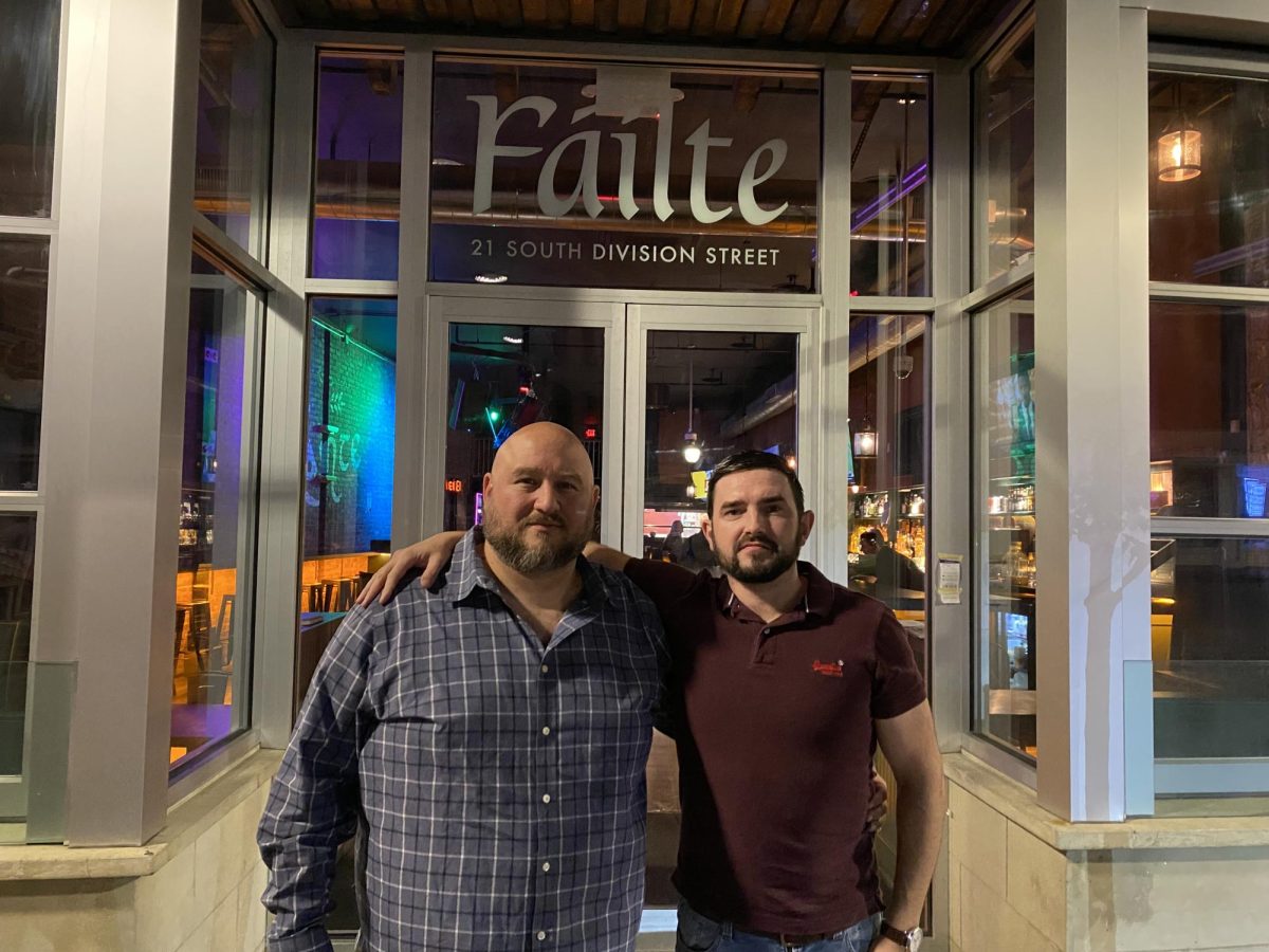 Owners Enzo DeRaco and Anthony Maguire outside their pub Slainte on S. Division Street. Failte is the Gaelic word for Welcome. 