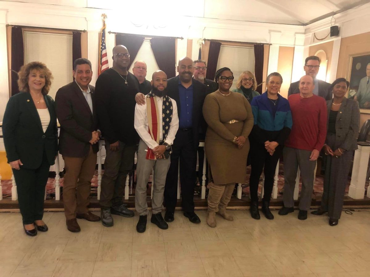 Peekskill Common Council members pose for a picture with new members of the police Civilian Complaint Review Board at City Hall Monday night. 