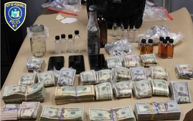Police make drug arrest, seize PCP and $80,000 in cash