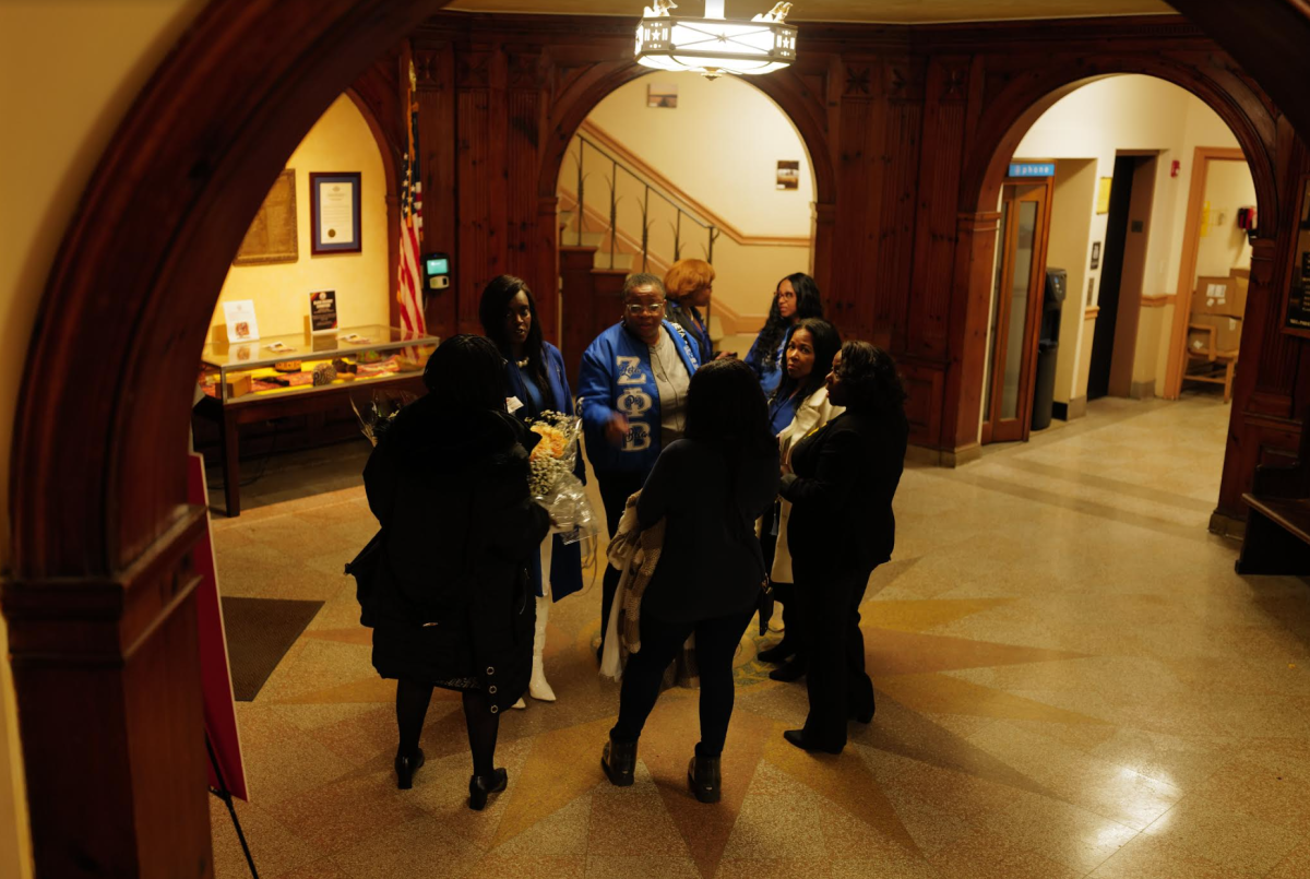 Honorees who were celebrated at the citys Black History Month ceremony Monday gather in the rotunda of City Hall. (Photo by Calvin Lom)