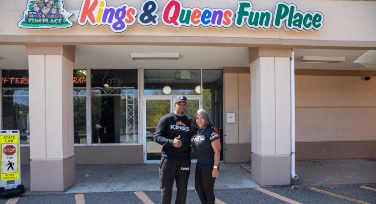 Walter King and his mom, Joan, in front of the future home of Kings House of Fire cannabis dispensary, set to open on June 19th on E. Main Street in Cortlandt. 