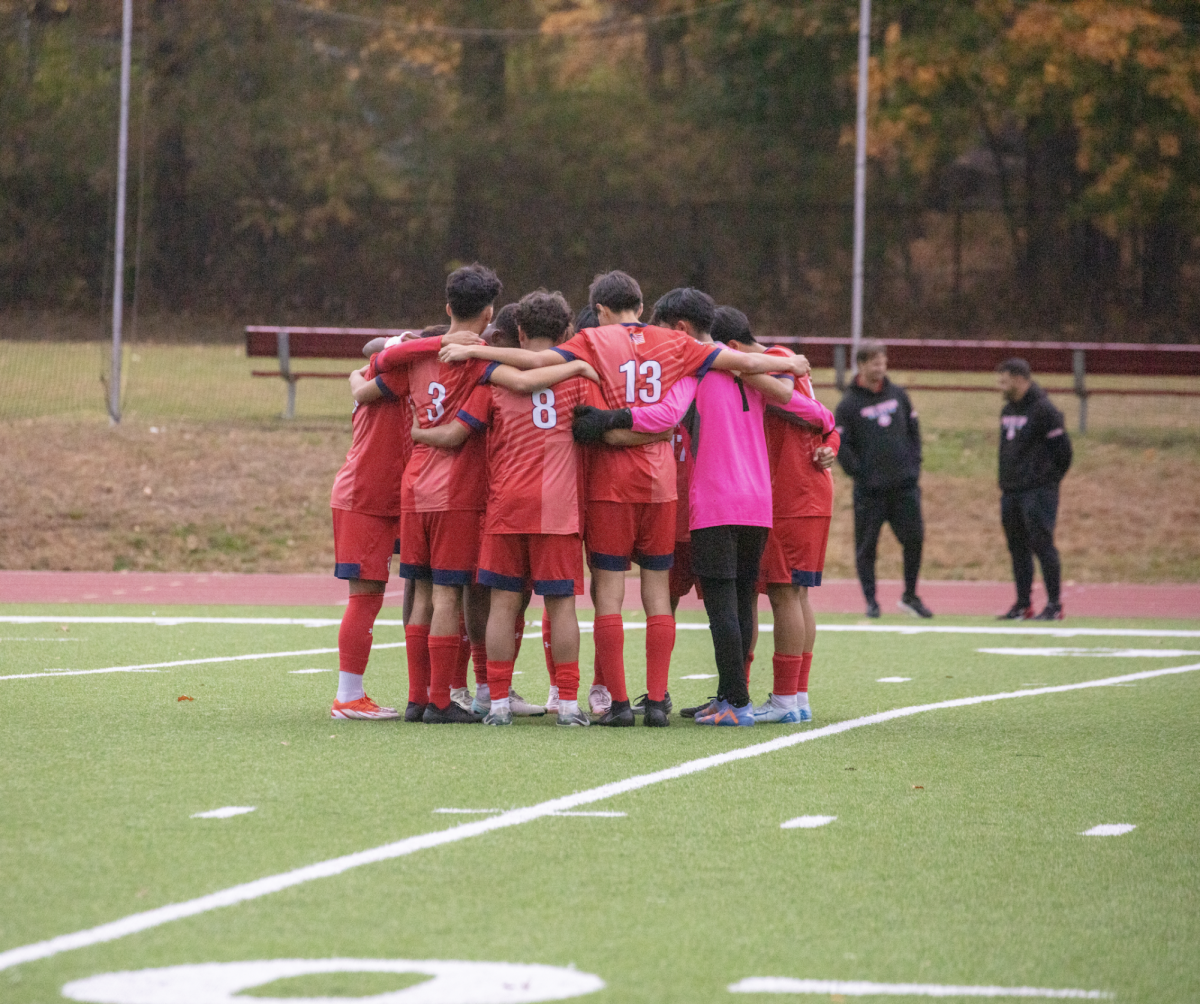 PHS Boys Soccer Team huddle before Tuesday's semifinal. They play today, Thursday, at Torpy Field at 3 p.m. 