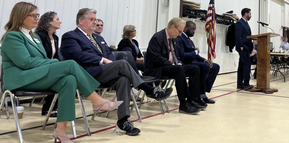 At the podium is U.S. Rep. Mike Lawler. At the front from left to right; district attorney candidate Susan Cacace, state Sen. Peter Harckham, assembly candidate Michael Capalbo, and former U.S. Rep. Mondaire Jones. At the back from left to right; Assemblywoman Dana Levenburg, district attorney candidate John Sarcone III, and state senate candidate Gina Arena.

