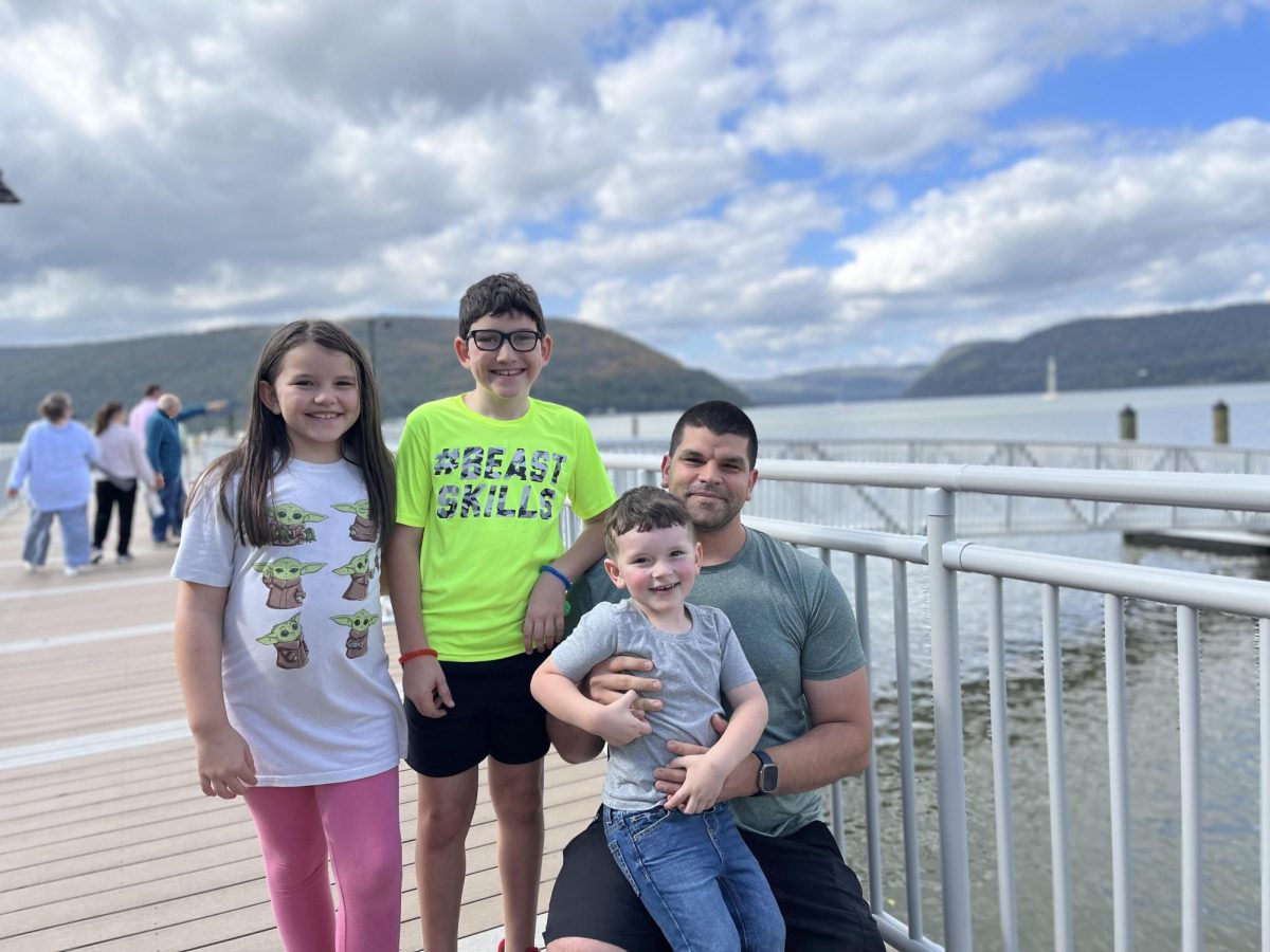 John Weiglein and children enjoy the remodeled Fleischmann Pier on Oct. 3, ahead of its official ribbon cutting event on Oct. 13.