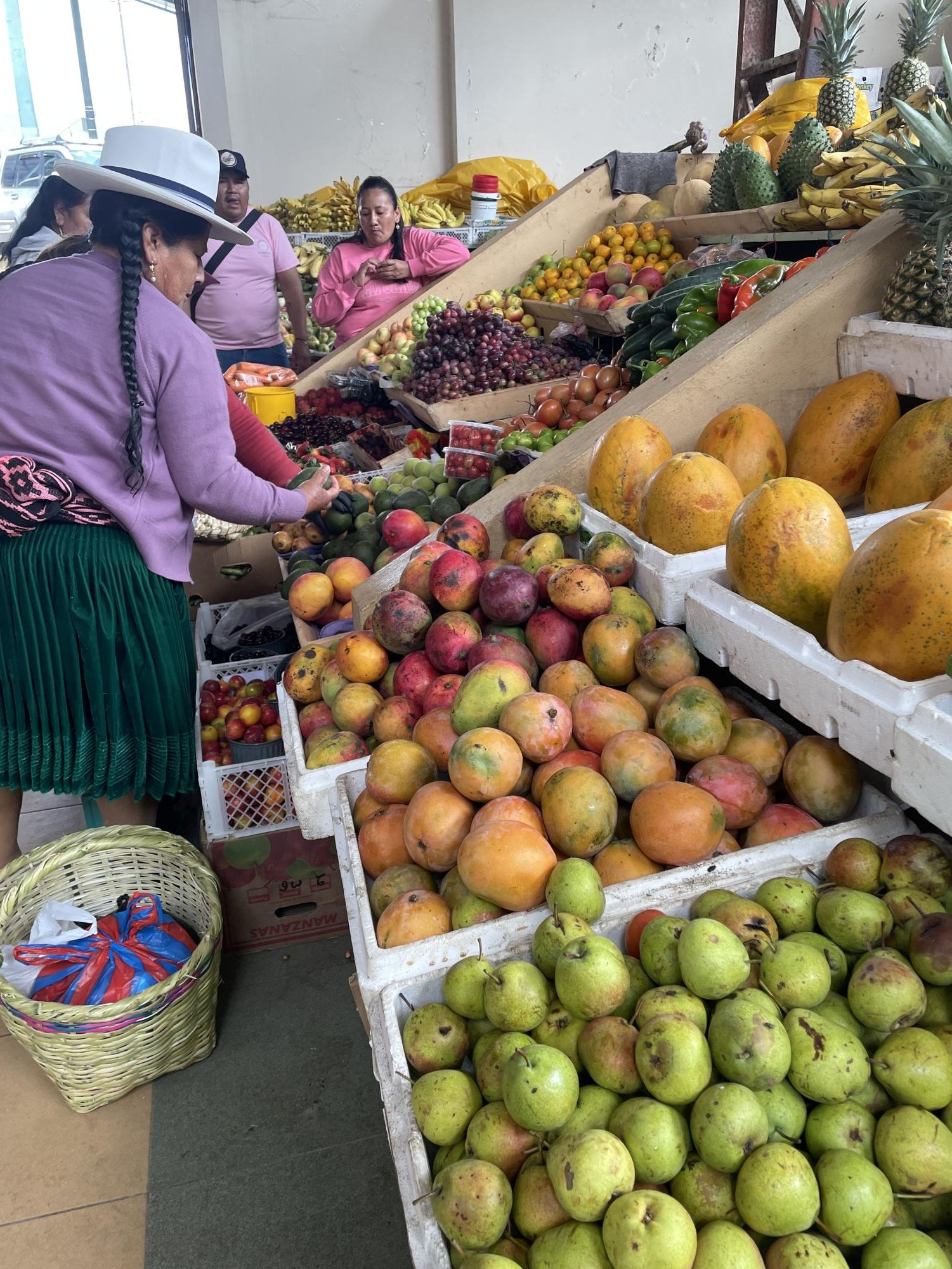 Scenes from the weekly market as the town prepares for its annual Feb. 28 carnival 