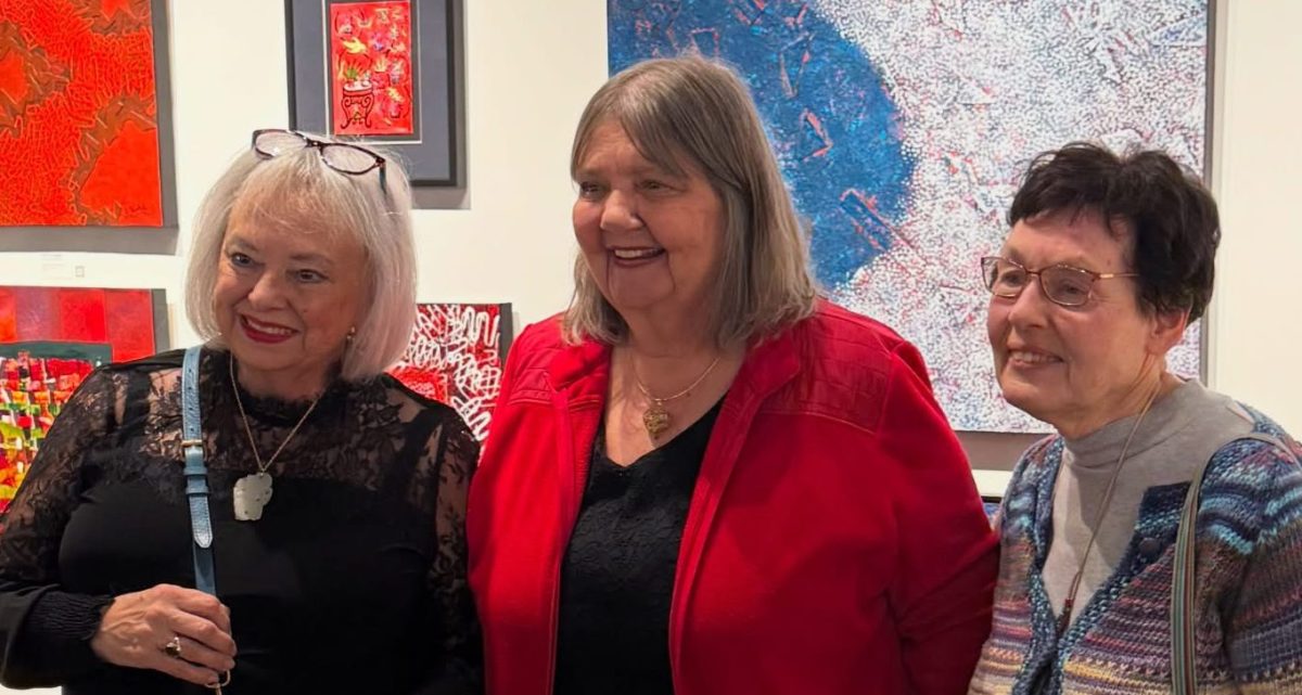 Joann Zwolski during her exhibition at Arbor Gallery, highlighting her innovative use of color and texture. 