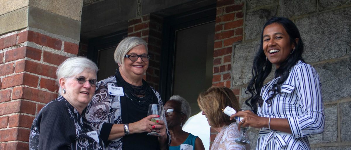 Carla Rae Johnson (far left) at an arts event in Peekskill, where she has played a pivotal role in the local cultural scene. 