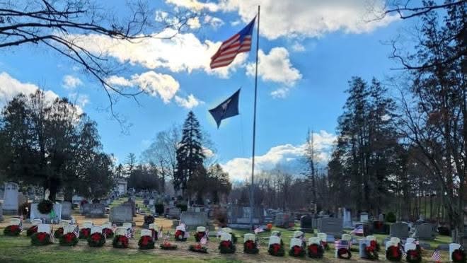 Flags placed on veterans’ graves as a symbol of national honor and gratitude. 
