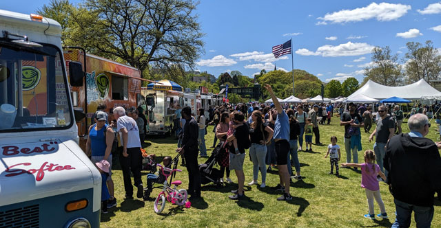 Families enjoying the Cherry Blossom Festival, with activities for all members of the household.