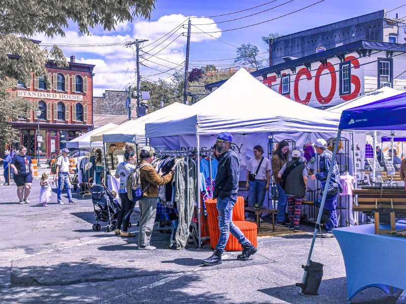 A past edition of the YAY! Market at Peekskill Station Square, where families and visitors browsed artisan booths.
