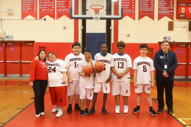 Peekskill’s Pioneer basketball team during the spring season. Coaches Christopher Kness and Delilah Kearney, both special education teachers, were also recognized for their leadership over the past two years.(Peekskill City School District)