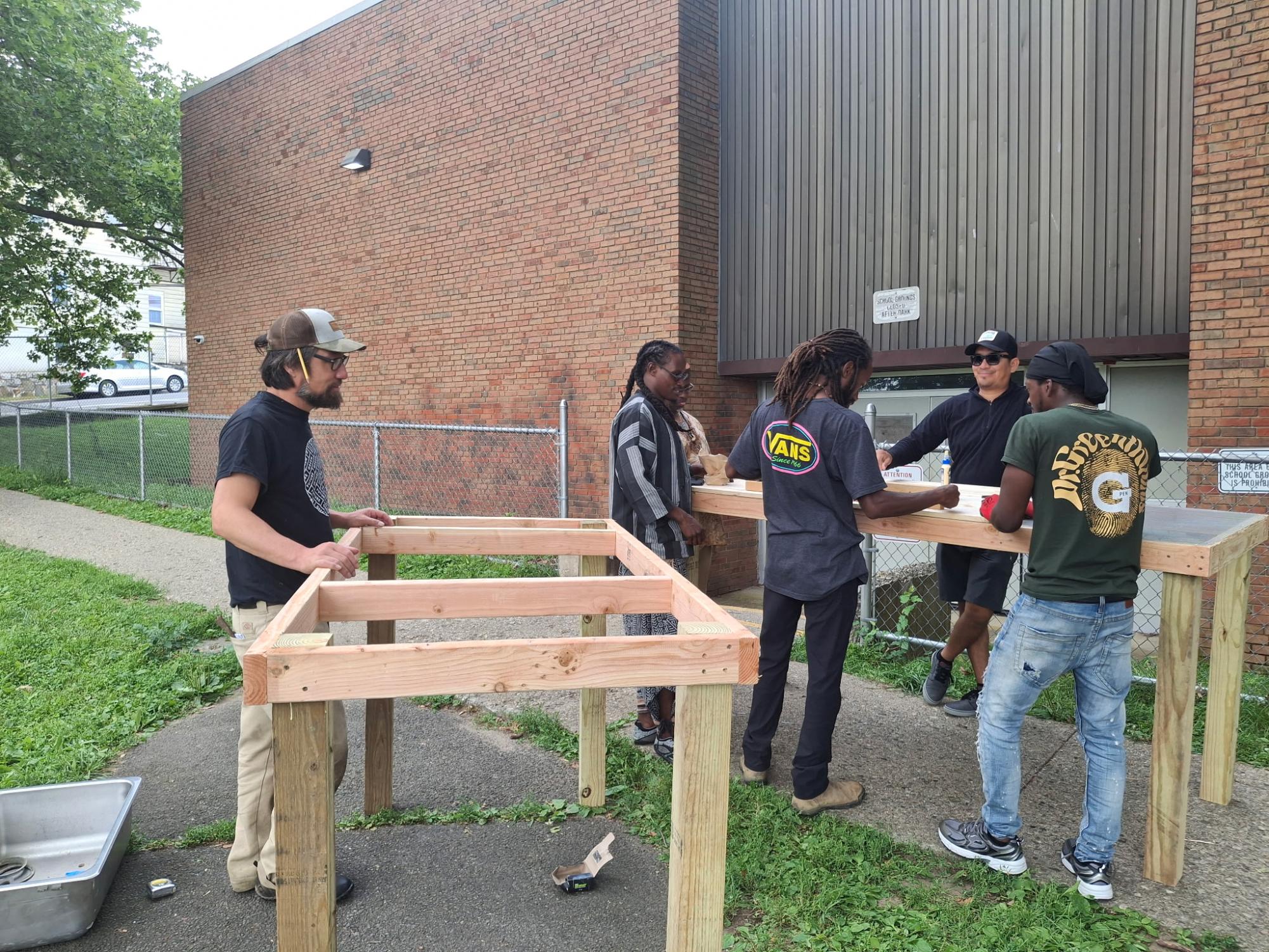 Work and play are all part of Men's Day at Peekskill's Regeneration Farm
