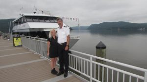 Laura and Frank Adam at Fleischmann Pier with their Emerald Princess in the background. 