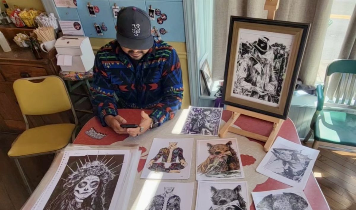 Sergio Benenson with some of his works during a previous exhibition. 