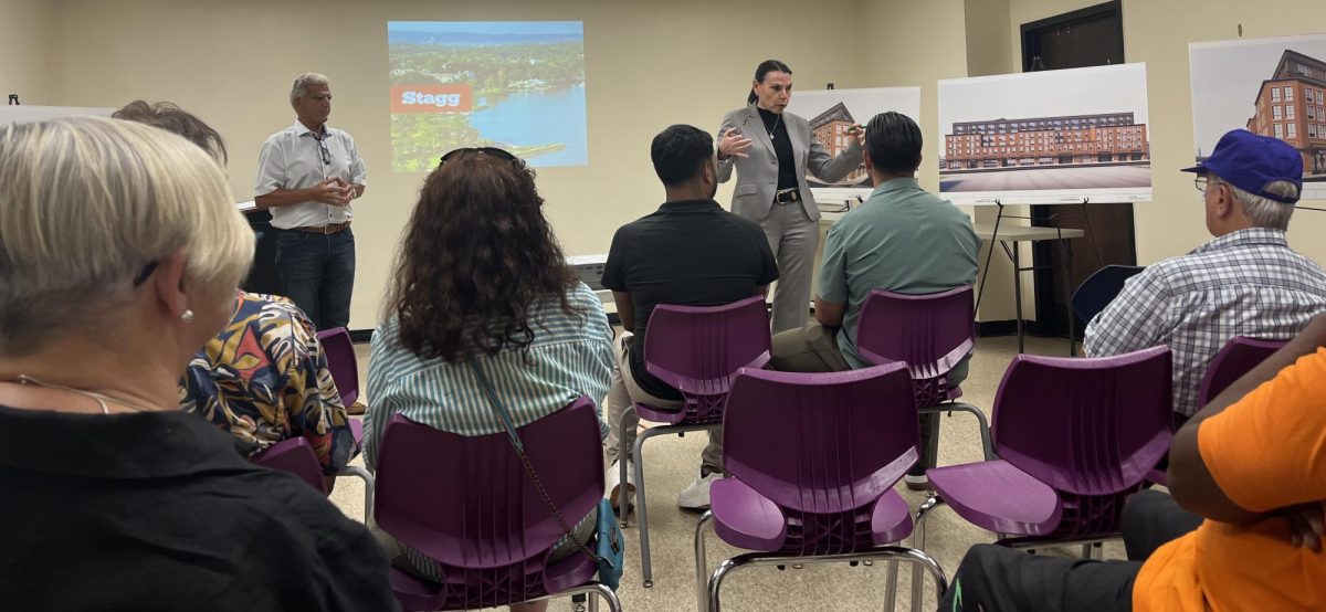 Residents listen to attorney Kathleen Bradshaw and Stagg Group's senior vice president Jay Martino at meeting on Wednesday night.   (Eric Harvey)
