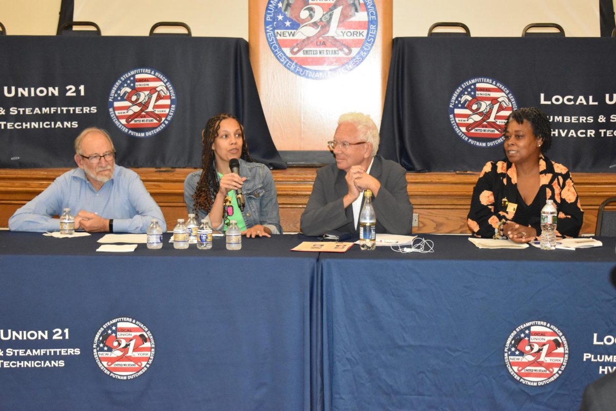 (From left) Panelists Michael Meeropol, Shana L. Redmond, moderator John Nichols, Kendall Hall. (Robeson in Peekskill Project)