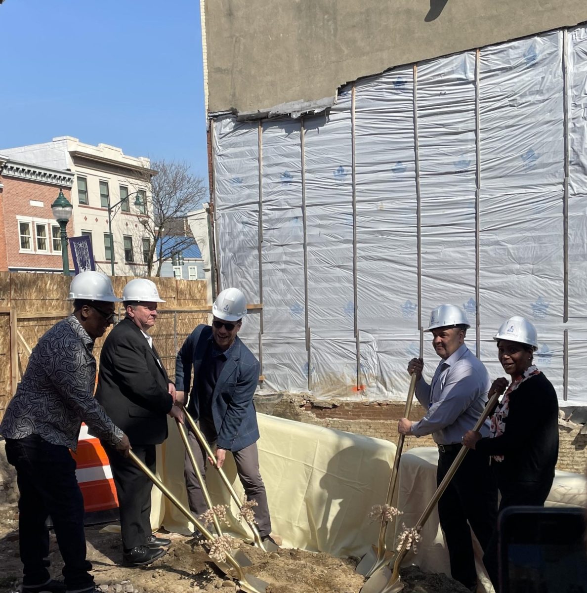(From left) Eric McKenzie, BID Executive Director Bill Powers, City Manager Matthew Alexander, Roger Campos of Mid Hudson Valley Federal Credit Union and Vivian McKenzie turning over the earth at groundbreaking on March 13, 2024. 