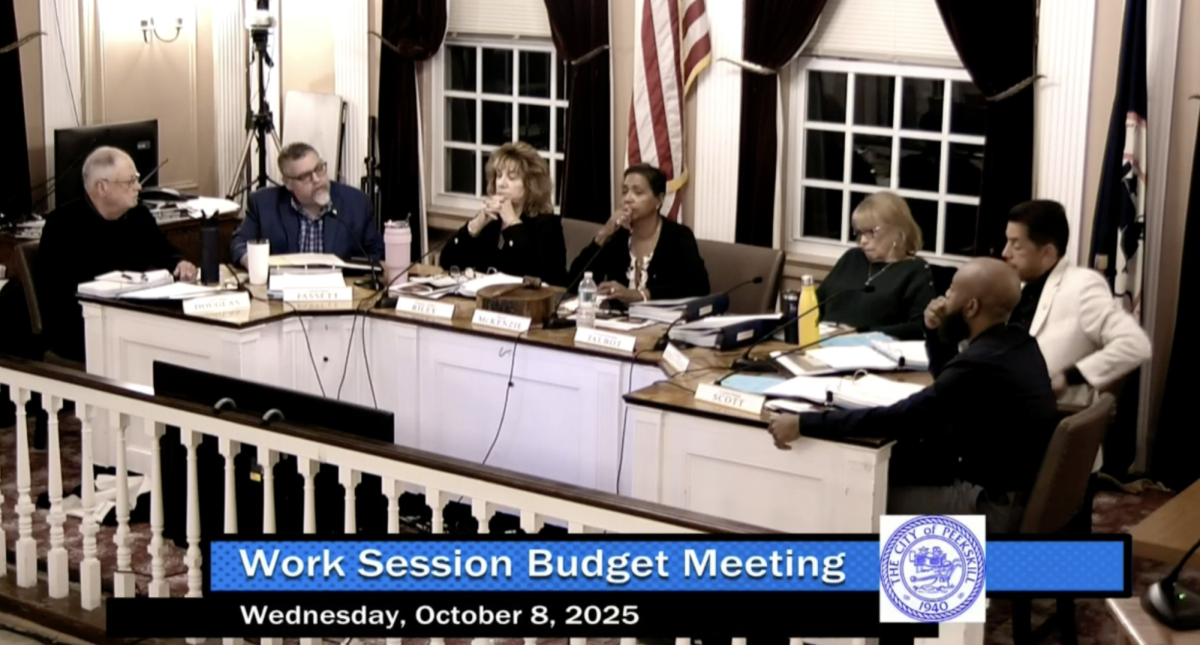 (From left) Dwight Douglas, Brian Fassett, Patricia Riley, Vivian McKenzie, Kathleen Talbot, Ramon Fernandez (white jacket), Robert Scott on Oct. 8. (City of Peekskill Work Session Budget Meeting screenshot)