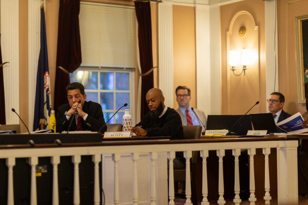 Peekskill Common Council members Ramon Fernandez (left) and Robert Scott (center), each of whom voted for the other’s censure. (Angela Bruno)