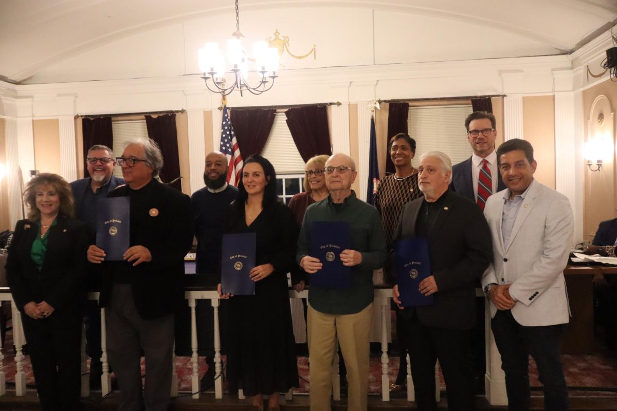 (From left) Deputy Mayor Patricia Riley, Councilman Brian Fassett, honoree Rev. George Coniglio, Councilman Robert Scott, honoree Anna Maria Del Monaco, Councilwoman Kathleen Talbot, honoree Joseph Schuder, Mayor Vivian McKenzie, honoree Paul Astrologo, City Manager Matthew Alexander, Councilman Ramon Fernandez.