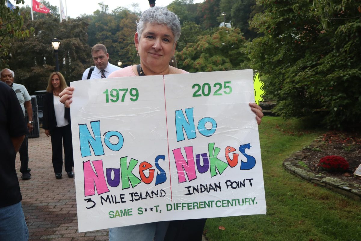 Protester Robin Freiman let her feelings be known outside Linda D. Puglisi Town Hall in Cortlandt, where the Indian Point Decommissioning forum took place. 