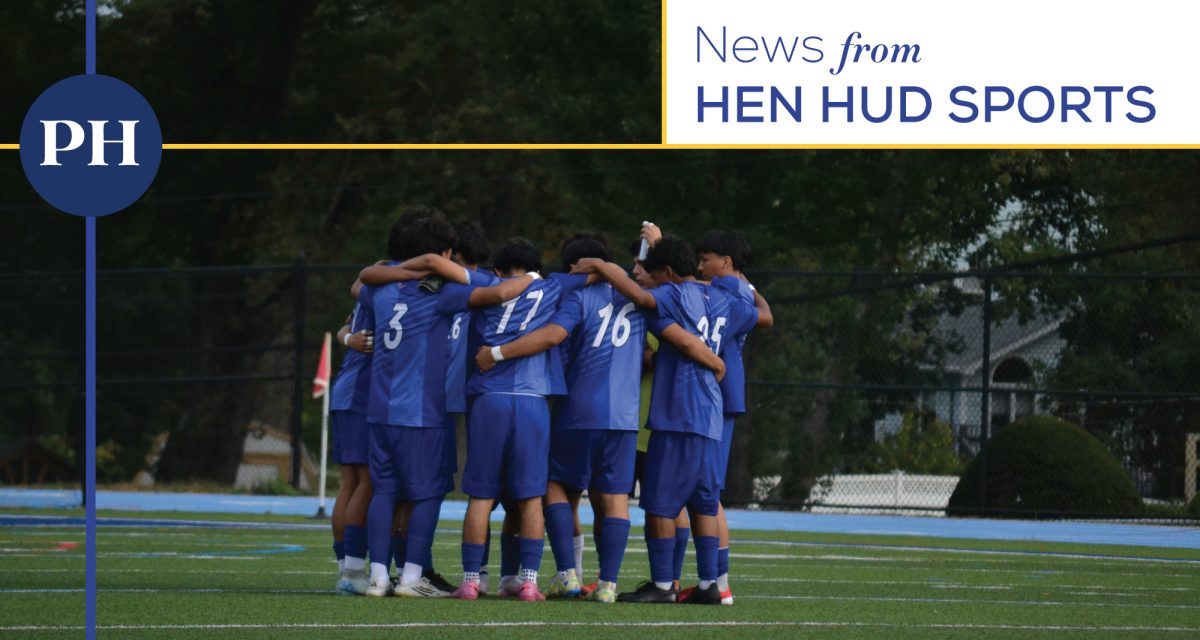 2025 Hen Hud varsity boys soccer team huddle. 