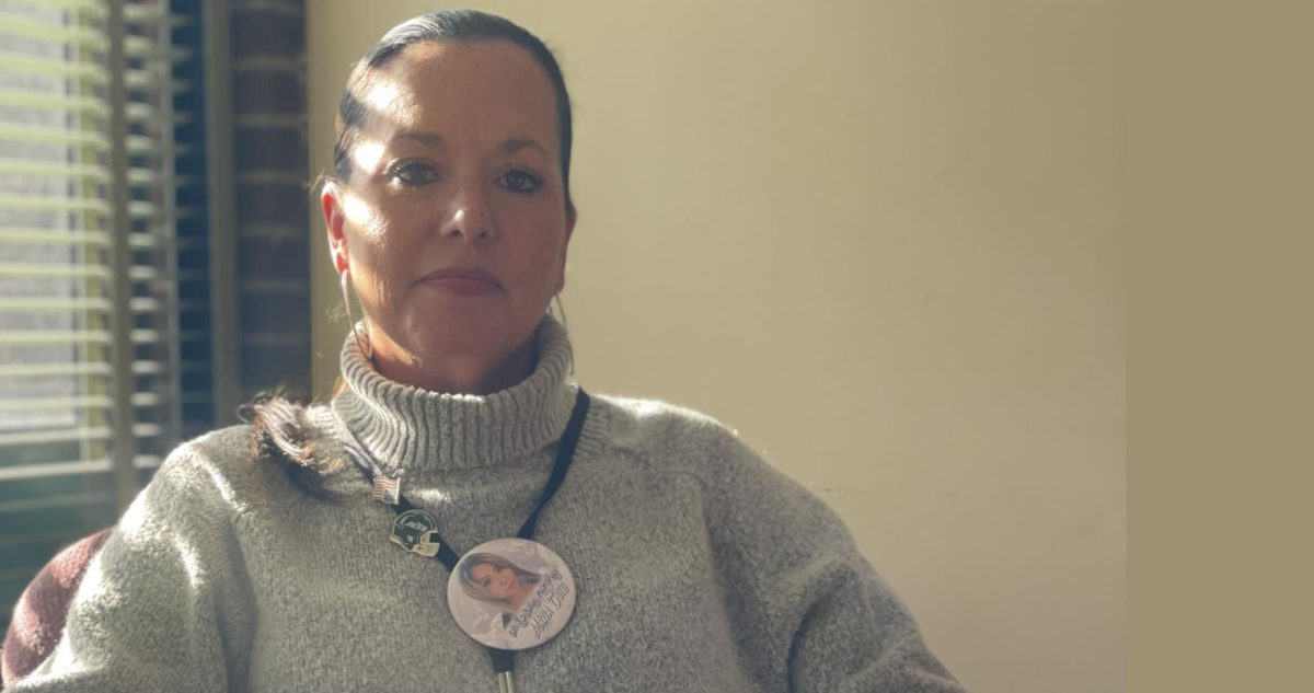 Elizabeth Vicchio wears the button remembering Maria attached to her 
DSS lanyard. Maria’s good friend Pat Lambert has her button hanging on the inside of her car. (Regina Clarkin)