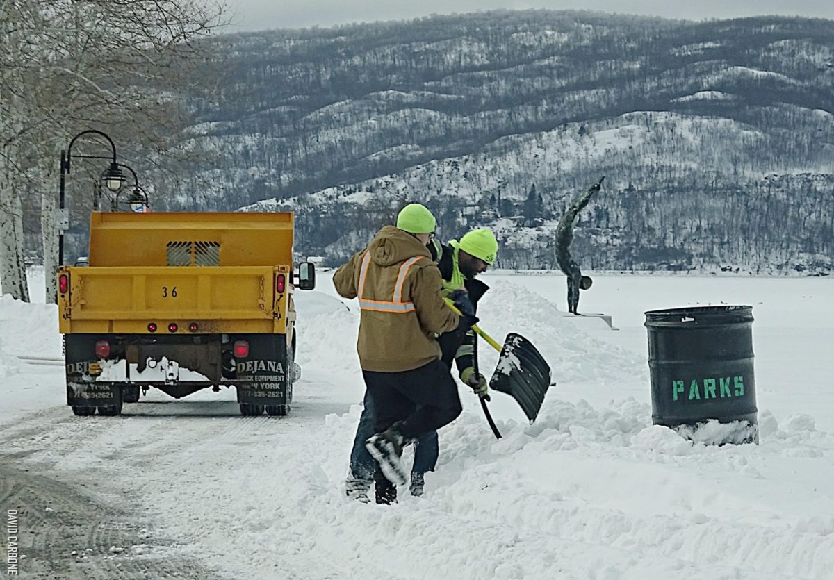 City workers shovel snow at Peekskill Riverfront Green on Monday, Jan. 26. (David James Carbone/Peekskill Today)