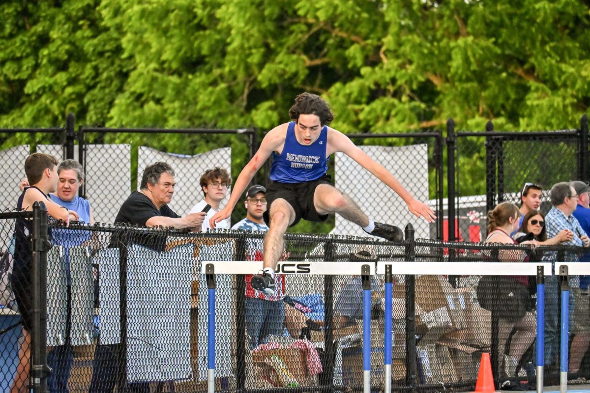 Hen Hud athlete competes in hurdles. 