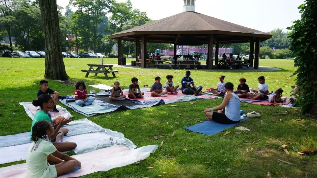 Wellness initiatives led by New Era Creative Space in Peekskill, including community yoga, self-care activities, and mental health programming for residents. (NECS)