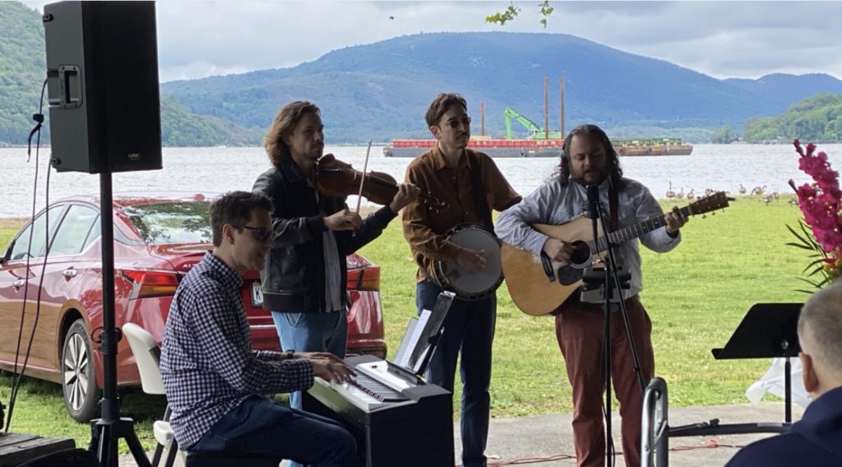 Visiting musicians participate in a previous outdoor worship service, a longstanding tradition of the church’s annual gathering. (Supplied)