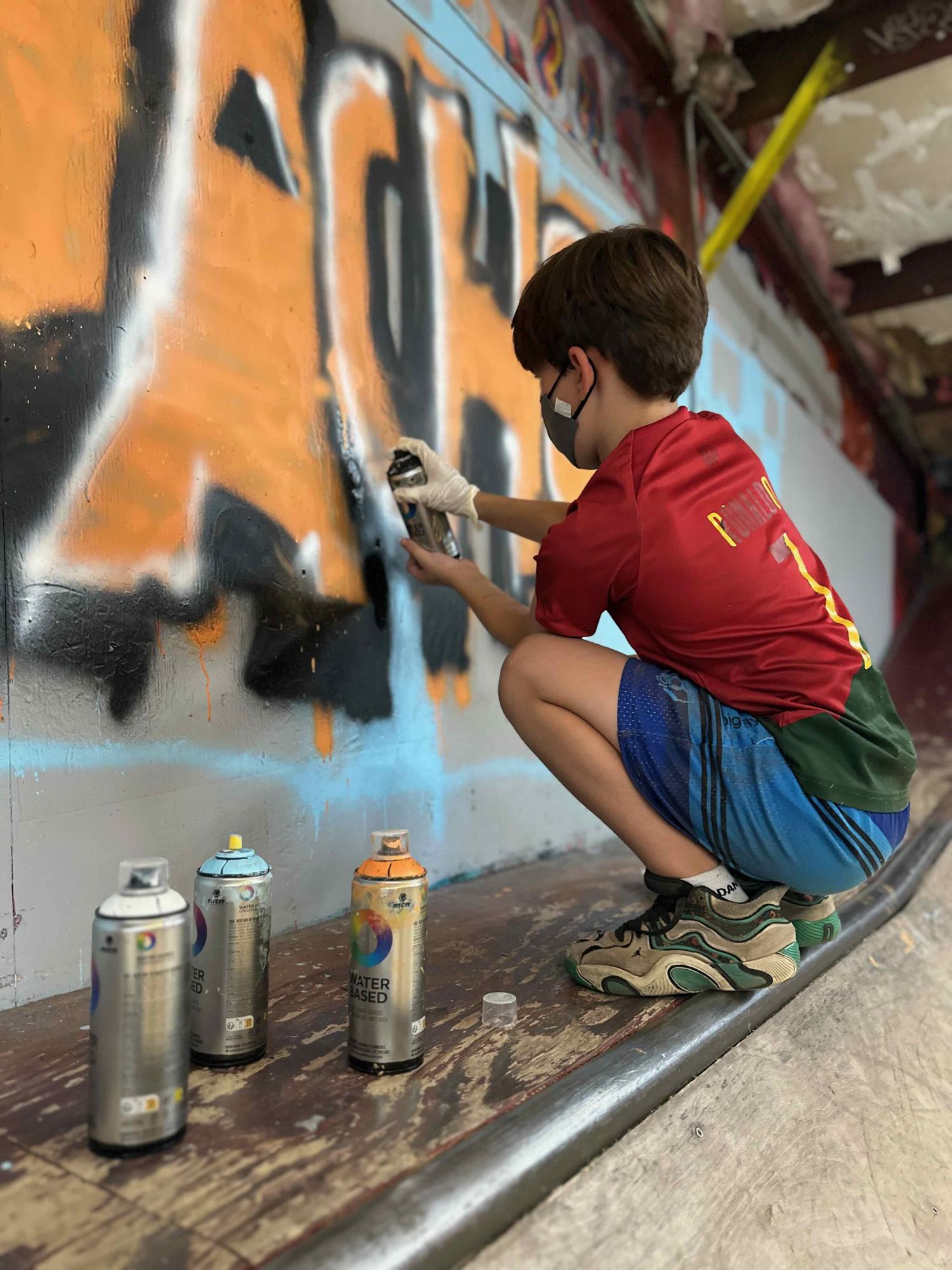 Local youth join the vibrant street art scene at graffiti camp